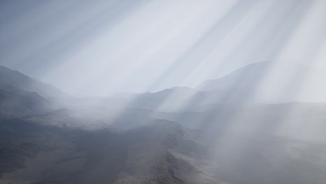 Sun-Rays-against-the-Backdrop-of-the-Mountains